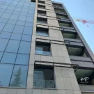اجرای بتن اکسپوز مستطیل، طرح بولت دار - پانچ دار - چهار سوراخ در نمای ساختمان