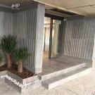 اجرای نمای ورودی ساختمان با بتن اکسپوز کرکره